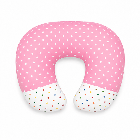 Ergonomic 22 by 28 inch feeding and nursing pillow in pink polka dot print