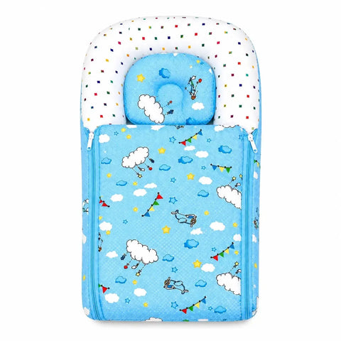 Soft cushioned sky blue baby carry nest with matching cloud print contoured pillow