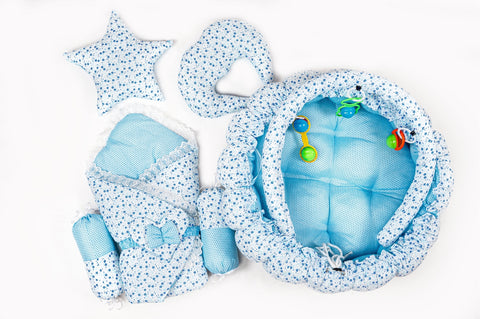 Complete 10 piece baby snuggle bed set with mosquito net in blue flower print