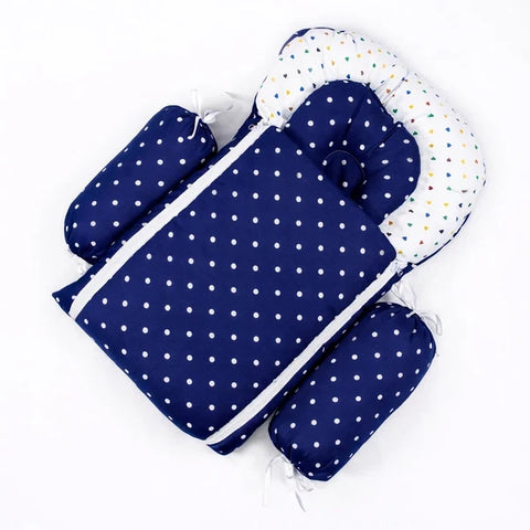 Soft padded dark blue baby sleeping bag carry nest unzipped flat in polka dot print pattern