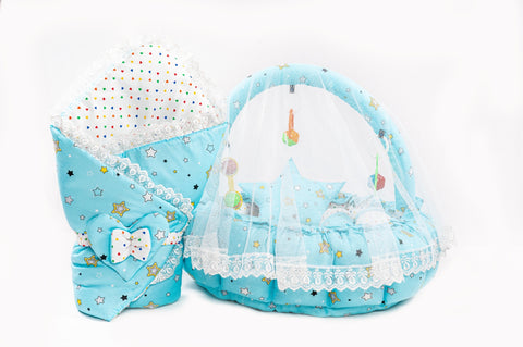 Soft baby snuggle bed with protective net and hanging rattle toys in sky blue star print