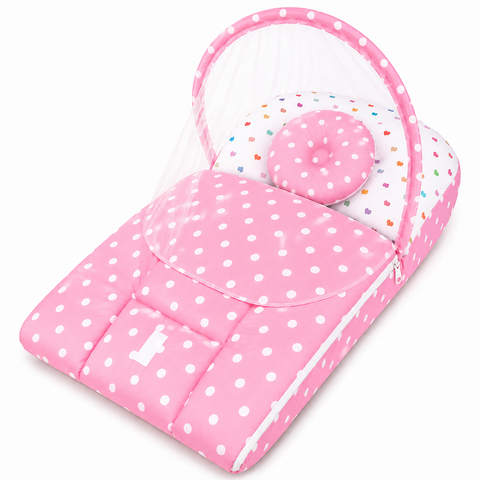 2 in 1 baby carry nest with mosquito net in pink polka dot print