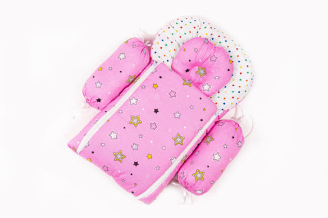 Soft padded pink baby sleeping bag carry nest unzipped flat in star print pattern