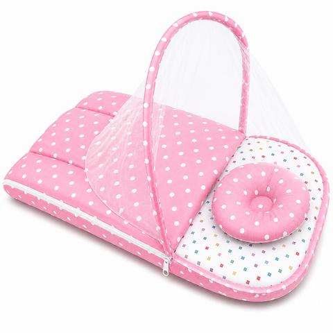 Zip up mosquito mesh net on pink polka dot print baby carry nest