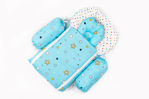 Soft padded sky blue baby sleeping bag carry nest unzipped flat in star print pattern