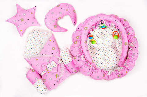 Complete 10 piece baby snuggle bed set with mosquito net in pink star print