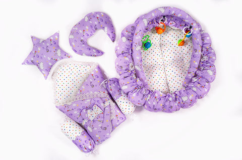 Complete 10 piece baby snuggle bed set with mosquito net in purple cloud print