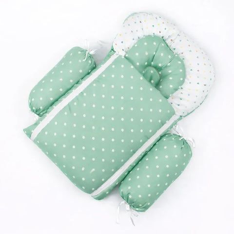 Soft padded green baby sleeping bag carry nest unzipped flat in polka dot print pattern