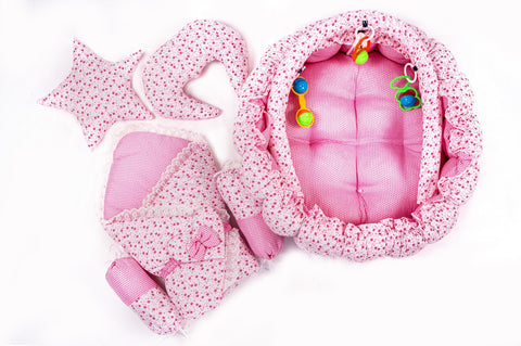 Complete 10 piece baby snuggle bed set with mosquito net in pink flower print