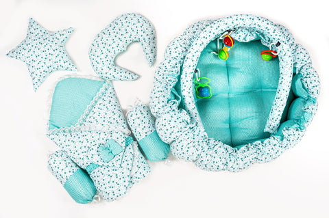 Complete 10 piece baby snuggle bed set with mosquito net in green flower print