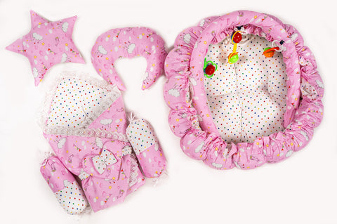 Complete 10 piece baby snuggle bed set with mosquito net in pink cloud print