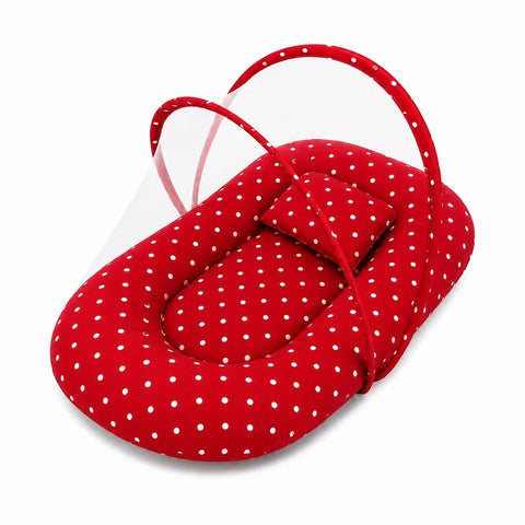 Baby mosquito net bed with matching pillow in red polka dot print