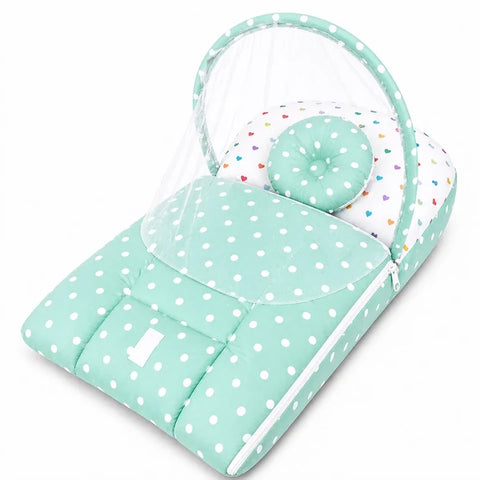 2 in 1 baby carry nest with mosquito net in green polka dot print