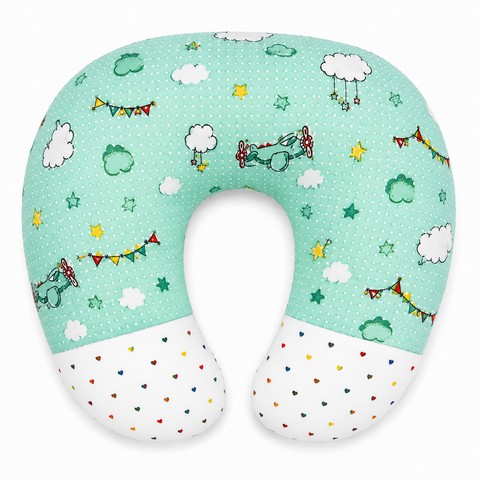 Ergonomic 22 by 28 inch feeding and nursing pillow in green cloud print