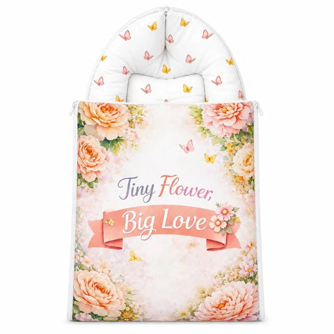 Soft cushioned baby carry nest laid flat unzipped in peach pink floral roses and butterfly print