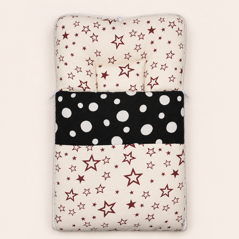 Soft cushioned baby carry nest laid flat unzipped in off white star print